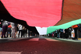 Buenos Aires, Argentina.- In the photos taken on November 29, 2023, Argentines participate in a flag-waving in support of Palestine at the Chancellery of Buenos Aires, to make visible what is happening in the Gaza Strip and also commemorate the International Day of Solidarity with the People of Palestine.